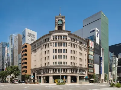 a building with a clock tower on top of it at GINZA HOTEL by GRANBELL in Tokyo
