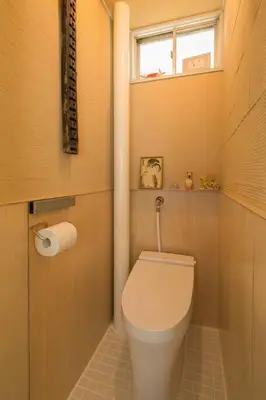 a small bathroom with a toilet and a window at PDO INN Coffee & Open-air bath on the roof in Tokyo