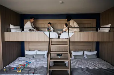 a group of people in a bunk bed at fav TOKYO RYOGOKU in Tokyo