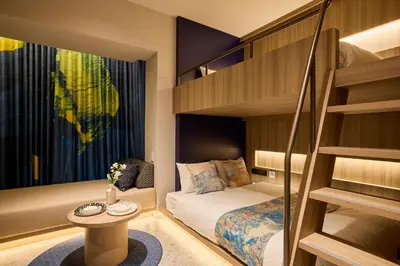 a small bedroom with a bunk bed and a desk at fav TOKYO RYOGOKU in Tokyo