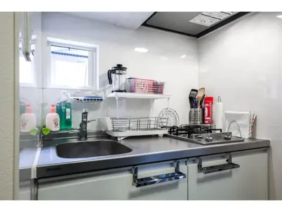 a kitchen with a sink and a counter top at North Cottage - Vacation STAY 09209v in Tokyo