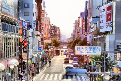 a city street filled with lots of tall buildings at Autumn Apartment Shinjuku in Tokyo