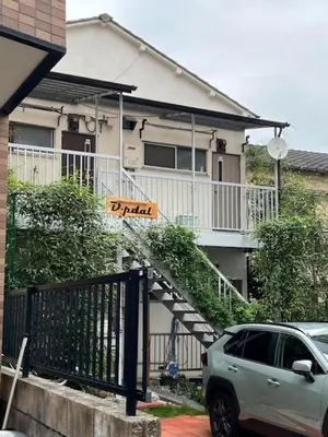 a car parked in front of a house at D-pdal Inn - Vacation STAY 38493v in Tokyo