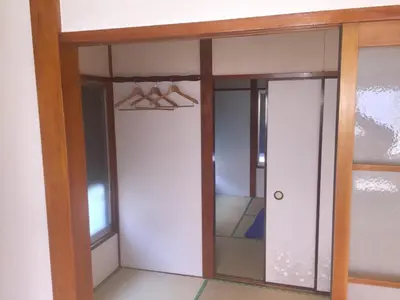 a room with a closet with a glass door at D-pdal Inn - Vacation STAY 38493v in Tokyo