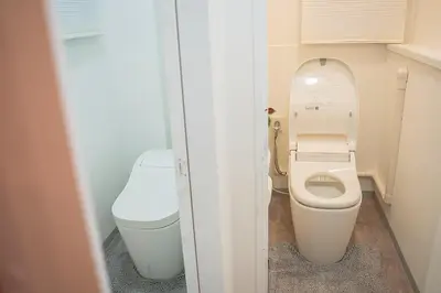 a small bathroom with a toilet and a sink at Business Hotel Kankokukan - Vacation STAY 41182v in Tokyo