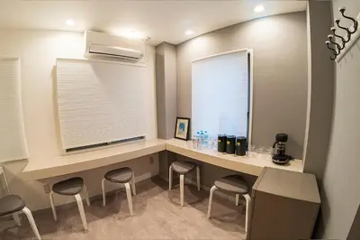 a home office with a desk with stools and a window at Business Hotel Kankokukan - Vacation STAY 41182v in Tokyo
