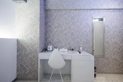 a bathroom with a white sink and a mirror at Hotaku HOTEL - Vacation STAY 98860v in Tokyo