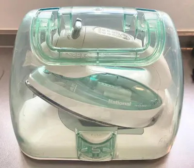 a glass container with a computer mouse in it at KOSUMOSU Ikebukuro Shinjuku Private House in Tokyo