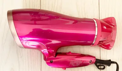 a pink glass bottle sitting on top of a table at KOSUMOSU Ikebukuro Shinjuku Private House in Tokyo
