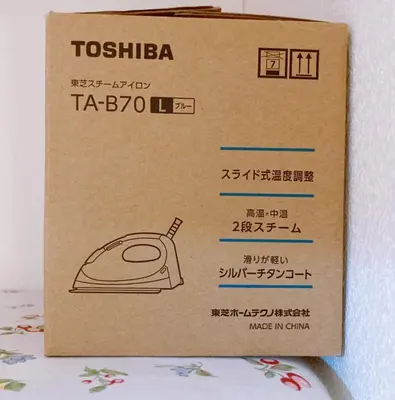 a box with a toaster on top of a table at KOSUMOSU Ikebukuro Shinjuku Private House in Tokyo