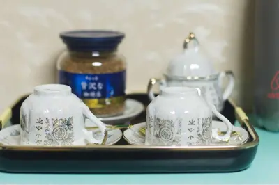 two teapots on a tray on a table at Mochida's Guest House in Tokyo