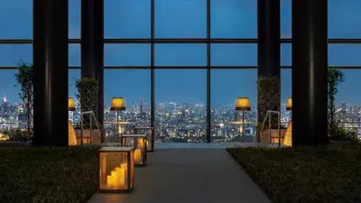 a view of a city from a building with lights at Bvlgari Hotel Tokyo in Tokyo