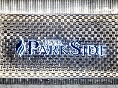a sign on the side of a building at HOTEL PARK SIDE in Tokyo