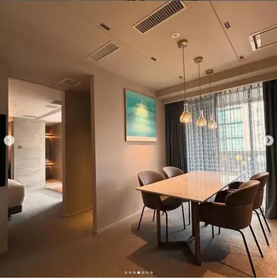 a dining room with a table and chairs at THE skM TOKYO HOTEL & DINING in Tokyo