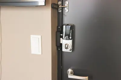 a door with a camera on the side of it at Hotel Tabiya in Tokyo