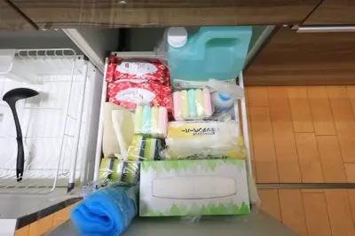 a drawer filled with items in a room at Sky House BnB in Tokyo