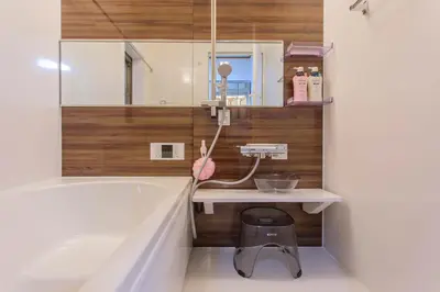 a bathroom with a tub and a sink at Sky House BnB in Tokyo