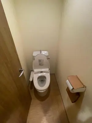 a bathroom with a toilet in a bathroom stall at TenTen Guesthouse in Asakusa in Tokyo