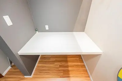 a white shelf in the corner of a room at Ueno Park Asakusa Temple Ueno Family Inn in Tokyo