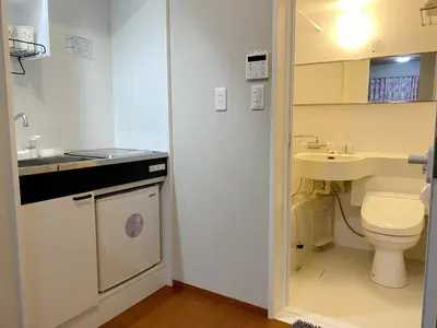 a small bathroom with a toilet and a sink at \u548c\u7e01WAEN in Tokyo