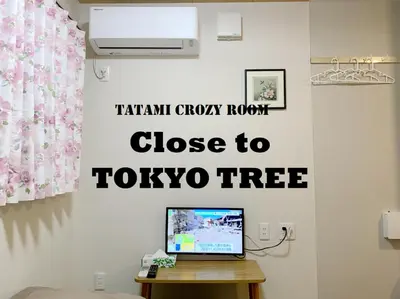 a laptop computer sitting on a table in a room at \u548c\u7e01WAEN in Tokyo