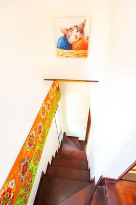 a staircase with a picture of a cat on the wall at 3BR Entire House for7 #91Rated TraditionCozy Japanese Villa in Ikebukuro 6mins St in Tokyo
