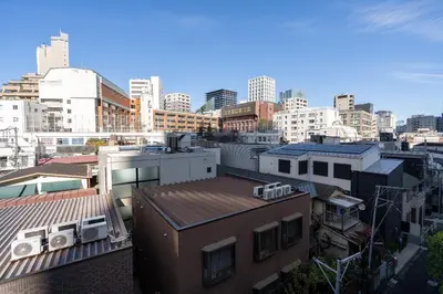 a view of a city skyline with buildings at CREAL premier\u8d64\u5742 in Tokyo