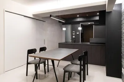 a kitchen and dining room with a table and chairs at CREAL premier\u8d64\u5742 in Tokyo