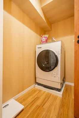 a microwave oven sitting on top of a wall at Sakura Suite in Tokyo