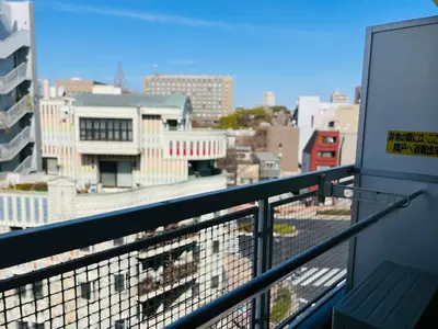 a balcony with a view of a city skyline at ZDt-612-SJ0152 in Tokyo
