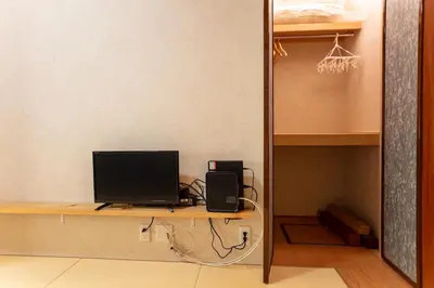 a desk with a computer monitor on top of it at \u548c\u7e01WAEN SKYTREE in Tokyo