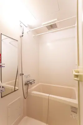 a bathroom with a shower and a bath tub at \u548c\u7e01WAEN SKYTREE in Tokyo