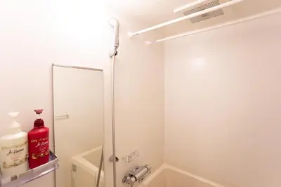a bathroom with a shower with a mirror at \u548c\u7e01WAEN SKYTREE in Tokyo