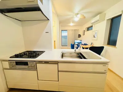 a kitchen with a sink and a stove at One-Ikebukuro TS0230 in Tokyo