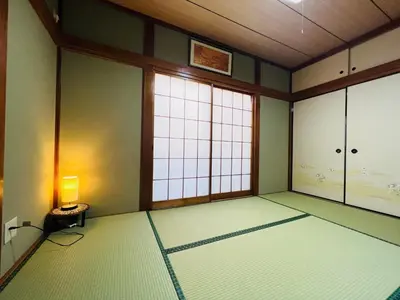 an empty room with a large window and a table at Ikebukuro Sta 8 mins Good Access Modern House TS0318 in Tokyo