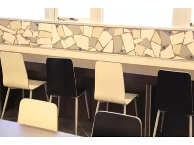 a row of chairs sitting in front of a bar at R & B Hotel Kamata Higashiguchi - Vacation STAY 38816v in Tokyo