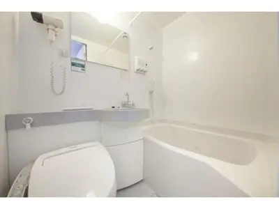 a bathroom with a toilet and a sink and a tub at R & B Hotel Kamata Higashiguchi - Vacation STAY 38816v in Tokyo