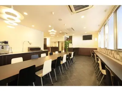 a conference room with a long table and chairs at R & B Hotel Kamata Higashiguchi - Vacation STAY 38814v in Tokyo