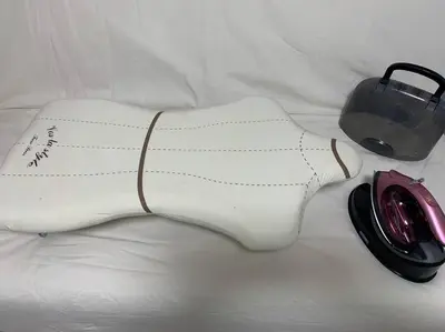 a white dog shaped object next to a computer mouse at COCO Nakameguro 202 in Tokyo