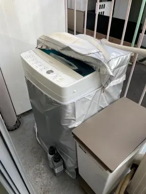 a baby crib with a bed with a pillow on it at BEST LOCATED SHINJUKU CENTRAL Full-Furnished APARTMENT 3minWalk to Station2 in Tokyo