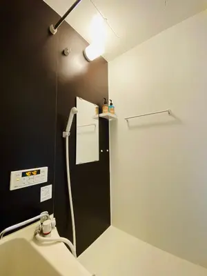 a bathroom with a sink and a toilet at Lucky you! YOTSUYA in Tokyo