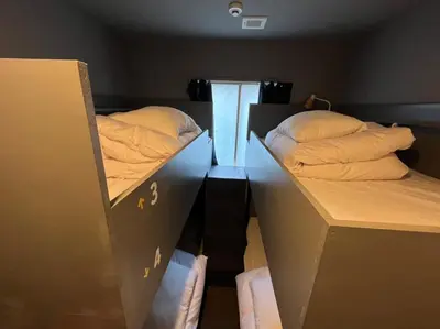 two bunk beds in a room with at Rhodes Otsuka Hotel in Tokyo