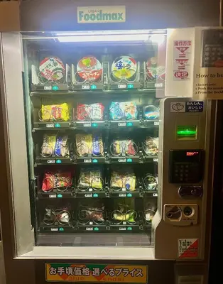 a vending machine filled with food items in it at Rhodes Kagurazaka in Tokyo