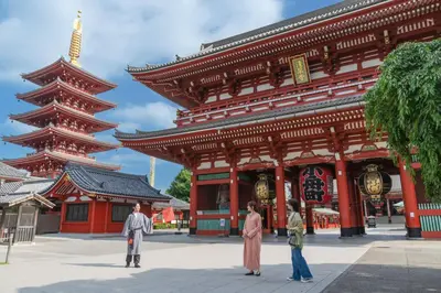 a group of people standing in front of a building at OMO3 Asakusa by Hoshino Resorts in Tokyo
