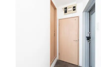a door leading to a room with a doorhaarhaarhaarhaarhaarhaarhaar at ILIMA Higashi Nakano - Vacation STAY 89452v in Tokyo