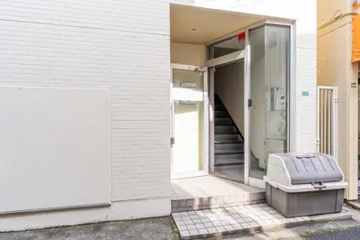 a door to a building with a toilet outside at ILIMA Higashi Nakano - Vacation STAY 89452v in Tokyo