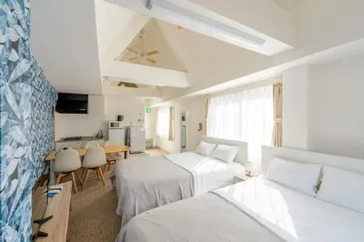 a hotel room with two beds and a kitchen at ILIMA Higashi Nakano - Vacation STAY 89505v in Tokyo