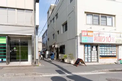 a person is playing with a kite on a city street at ILIMA Higashi Nakano - Vacation STAY 89505v in Tokyo