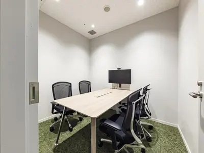 a conference room with a table and chairs at &Here TOKYO UENO in Tokyo