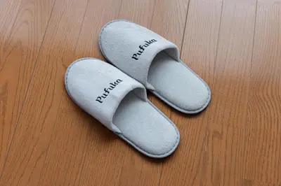 a pair of slippers with the words miracle on them at \u3077\u3075\u304b\u4e21\u56fd\u3000\uff08pufuka Ryogoku) in Tokyo